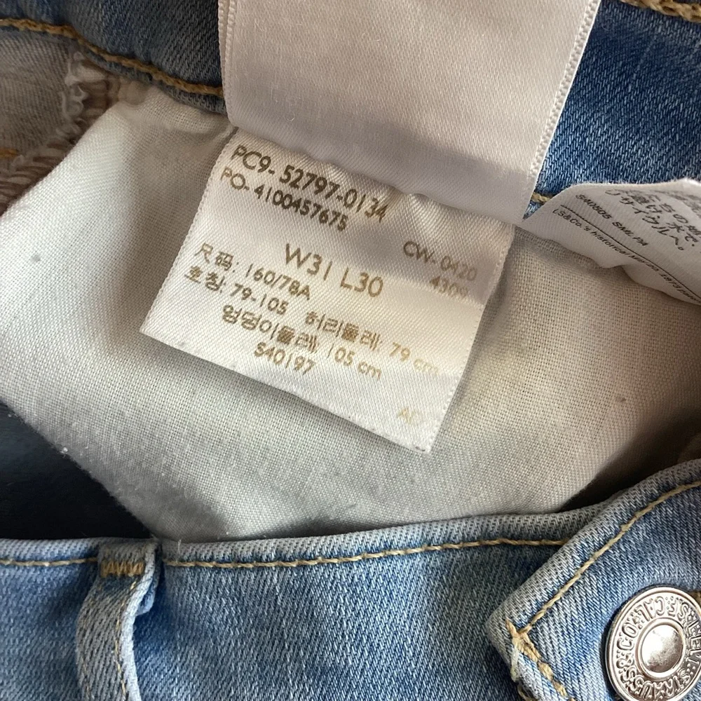 Levi's 720 High Rise Super Skinny Light Wash Distressed Raw Hem Jeans‎ Size 31